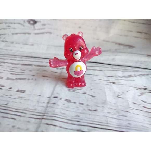 FIGURE Care Bear Plastic Blind Bag 2" PINK Glitter SECRET Heart Locket Cake Top - Picture 1 of 6